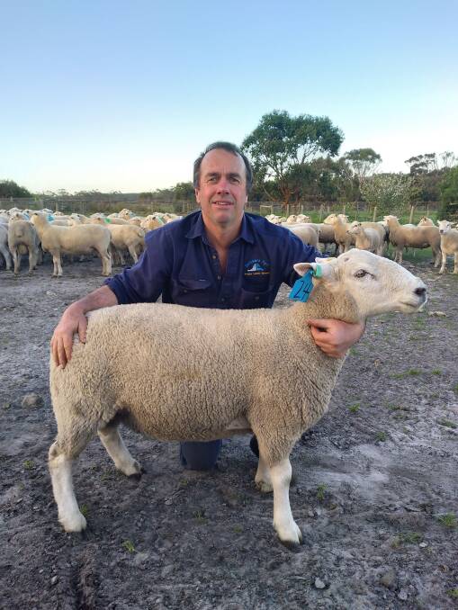 BEST RAM: Cashmore Oaklea's John Keiller with the top priced ram, which sold for $8000.