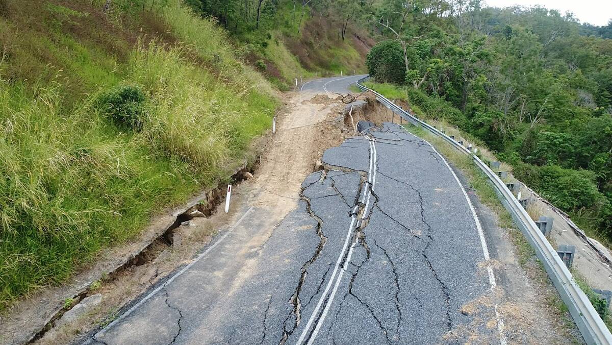 The state of the road after landslides caused by Tropical Cyclone Debbie, which repairers had to contend with.