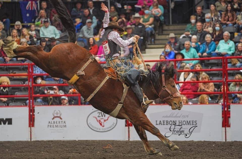 Warwick's Lach Miller conquering another saddle bronc ride in the Canadian Finals Rodeo on the weekend. Picture: Gralyn J Photography