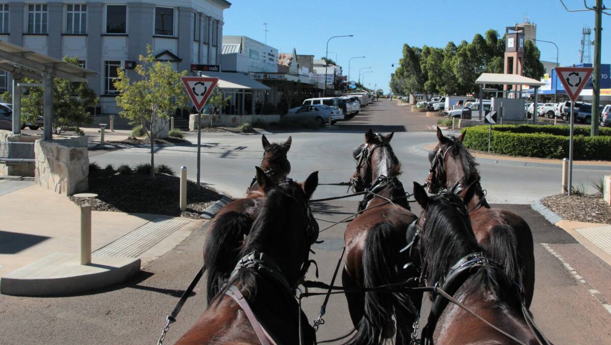 Kinnon and Co's Cobb and Co coach ride through Longreach is one of the authentic outback Queensland experiences.