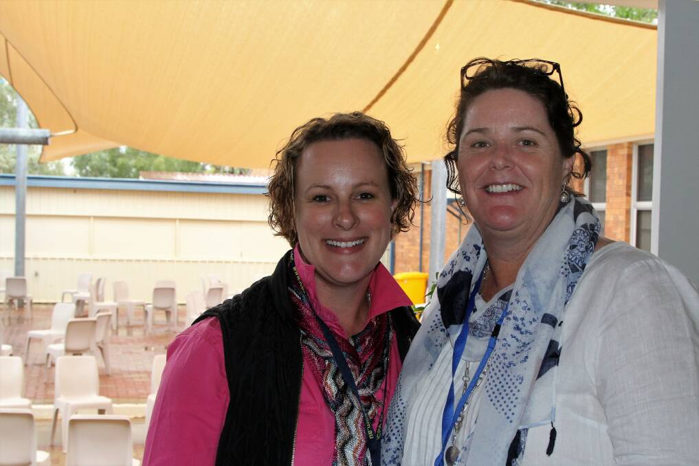 Moonie's Tracey Burke and Melinda White were working hard as delegates at the conference. Pictures - Sally Cripps.
