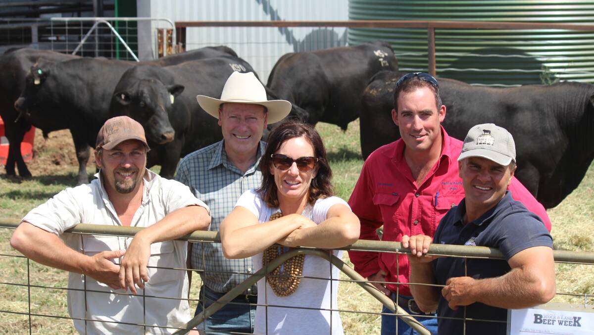 Hot demand: Tim and Jessica Scott, Table Top Angus, pictured with Mick Teschner, Huon Creek, NSW, Daryl Pearson and Dan Holt, Albury.