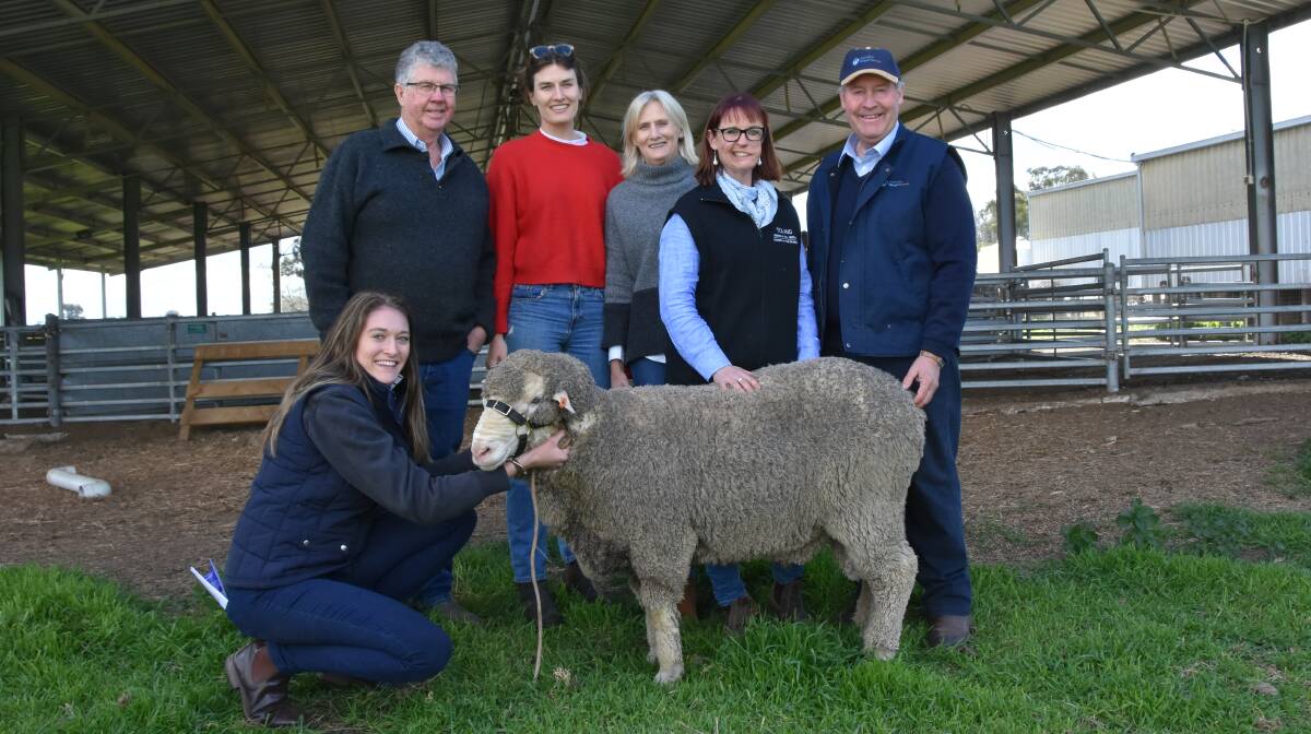WHOLE PACKAGE: Madison Ridgway, Phil Toland, Edwina and Susan Sleigh, Anna Toland and Australian Wool Network wool and sheep specialist Ron Creek, with the top-priced ram. 