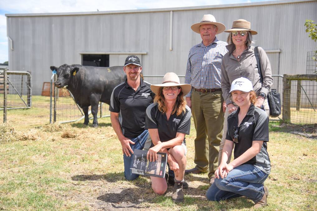 Top bull: Boonaroo principals Shane and Jodie Foster, with daughter Claire, and top priced buyers Susie and Rob Coulsen, from The Point, Birregurra. 