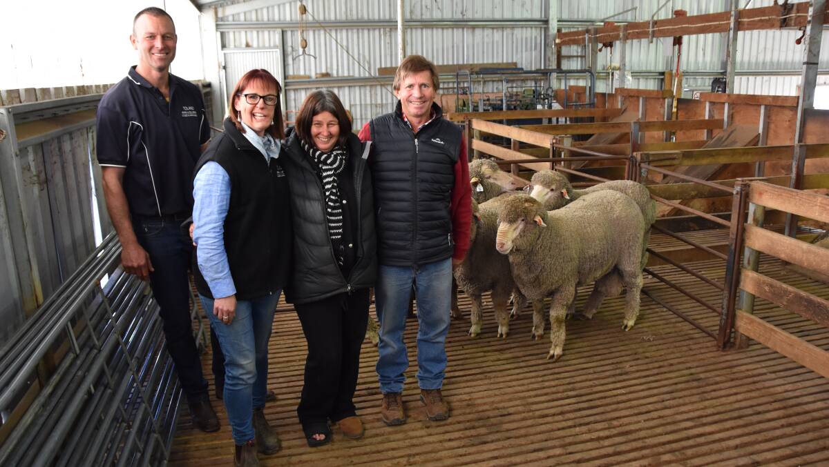 BUY UP: Toland Poll Merino co-principals Simon Riddle and Anna Toland, with Jackie and Phil Muecke, Woodebo, Penola, SA, who bought four rams, for an average $4375.