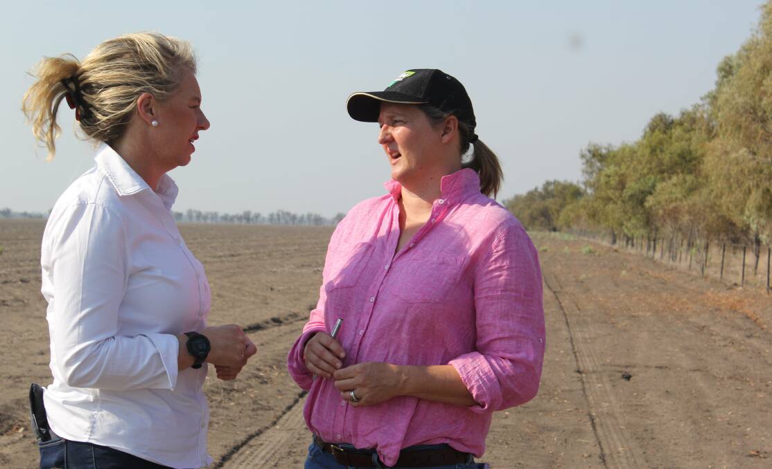 Federal Agriculture Minister Bridget McKenzie and Bec Reardon talk business during the Ag Ministers visit to the Reardon family's farm in December. 