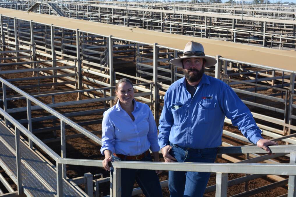 Animal Health Australia biosecurity and extension manager Rachael O'Brien with Roma Saleyard manager Paul Klar at the Roma Saleyards. 