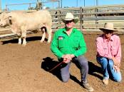 ADAPTABLE GENETICS: Glenlea Beef stud principal Roderick Binny and Elders Winton agent Scott Taylor with the top priced bull at the stud's Winton sale in 2021. The stud holds three bull sales in Queensland each year.