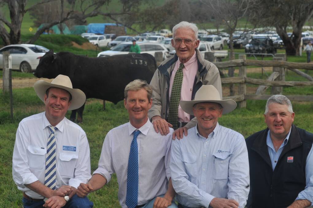 Auctioneer Paul Dooley; Ross Thompson and Wyatt Thomson, Millah Murrah; Jim Wedge, Ascot Angus, Warwick, Qld; and former ABS beef product manager Bill Cornell after the 2016 bull sale. Picture supplied