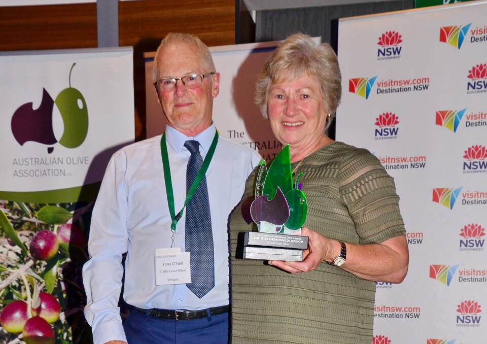 GOOD OIL: Cradle Coast owners Tony and Carol O’Neill, Tasmania, with one of their many awards received at the recent 2018 Australian International Olive Awards. 