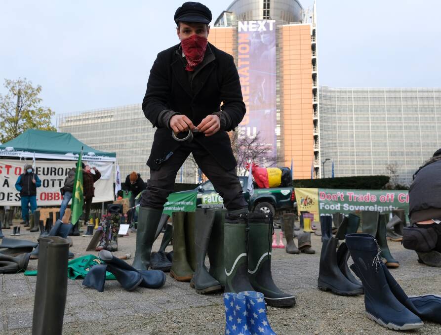 Environmental activist protests against the European Agricultural Policy in front of the EU Council headquarters in Brussels. Picture: Shutterstock