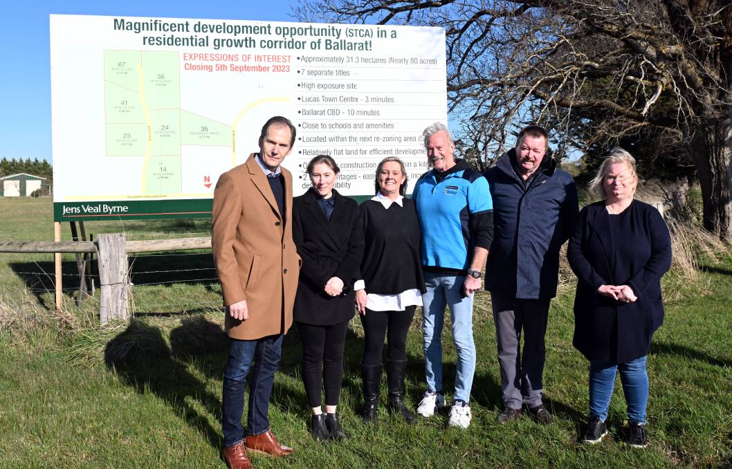 Neighbours join forces to sell little farm blocks (from left) agent Luke Veal, Rebecca Dwyer, Kim and Greg Forte, Michael Tuddenham and Tracie Abson. Picture from Ballarat Courier