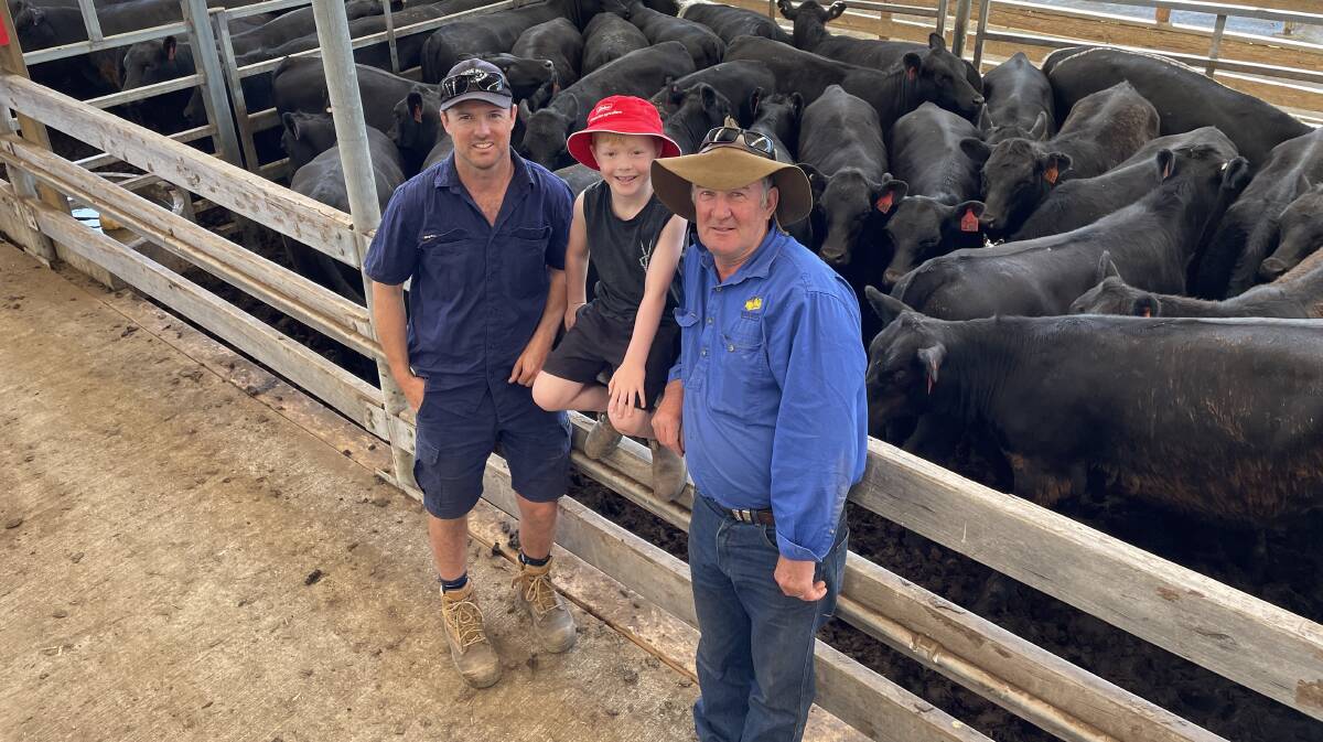 Dale Mibus and son Tom Mibus, 6, and Henry Compton, Sandy Camp, Gorae West, sold 73 Angus and Black Baldy heifers at Hamilton.