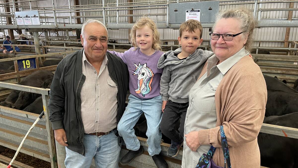 Michael and Linda Lizza, Lysterfield, with grandchildren Vivienne, 6, and Ellis, 4, sold steers to $1820 at Pakenham.