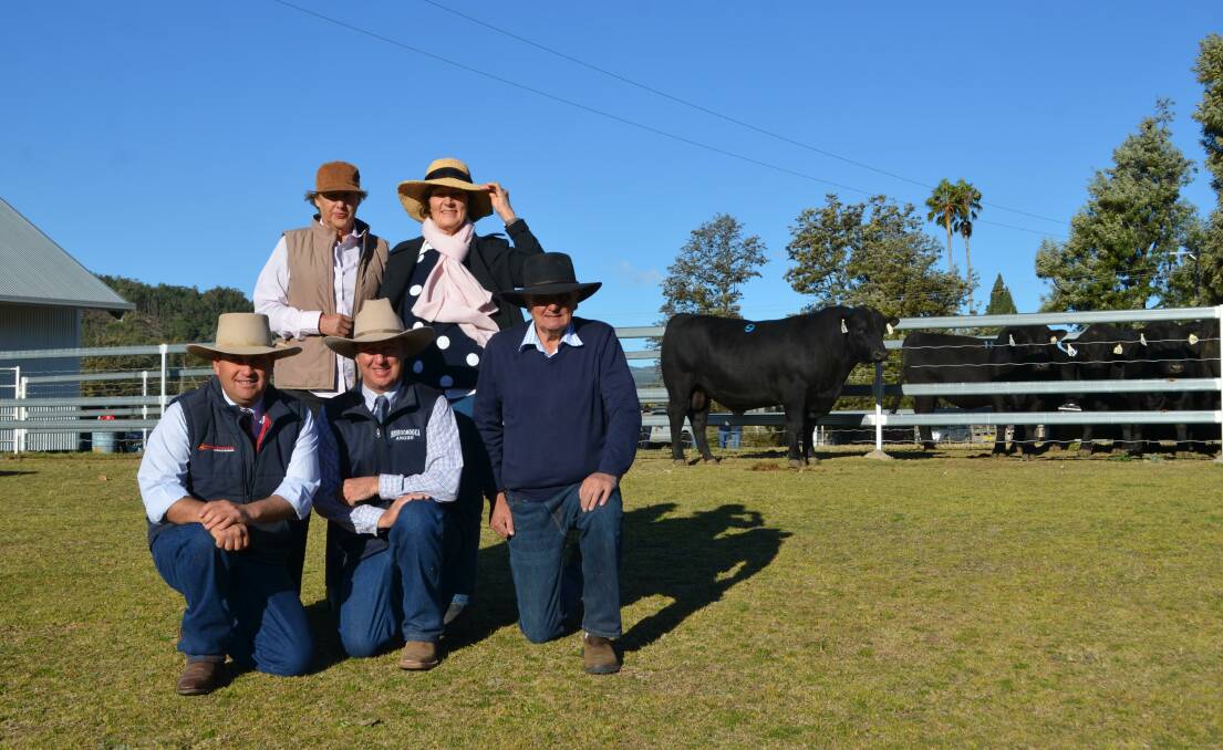 Luke Scicluna, auctioneer, Sinclair Munro, Juliet Munro with Richard and Jan Baillie with top selling bull 2017 sale.