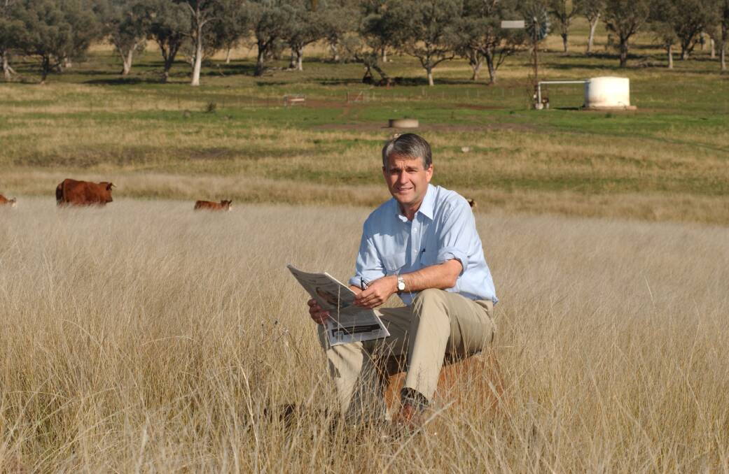DOWN ON THE FARM: Nationals' leader, John Anderson, on the family farm at Mullaley in north west NSW. He was probably happier on the farm than in Canberra. 