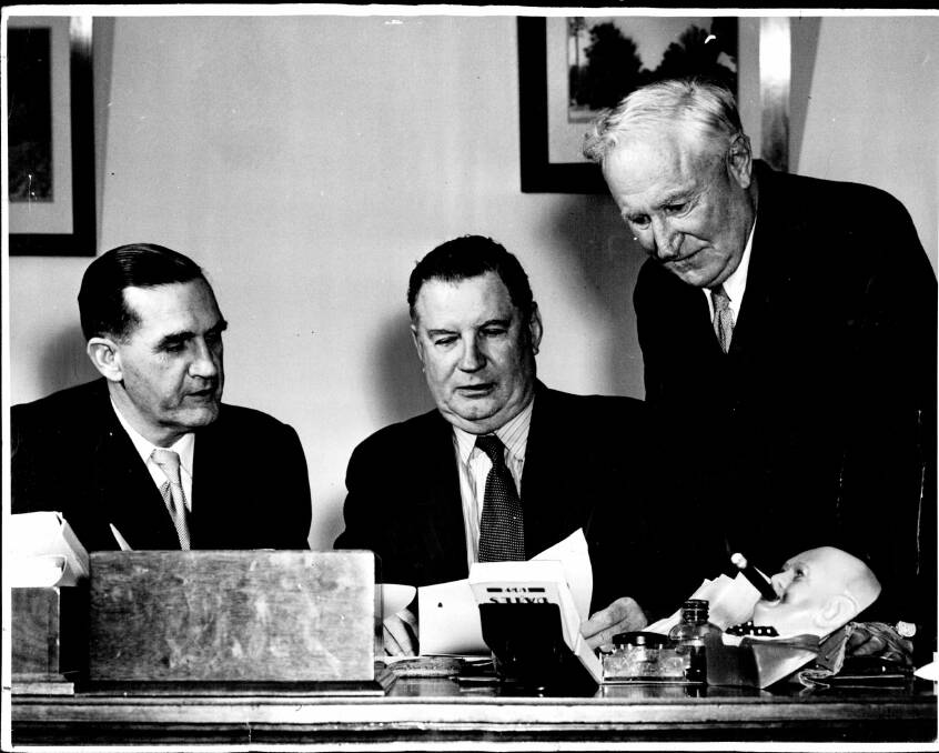 YES SIRS: The National Party's three Prime Ministers, Sir John McEwen, Sir Arthur Fadden, and Sir Earle Page, during a meeting in Canberra. 