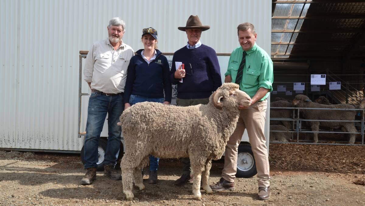 TOP PRICE: Brian Anderson, Binda, Hazeldean's Bea Bradley Litchfield and Jim Litchfield, and Nutrien's Rick Power with the top-priced ram. 