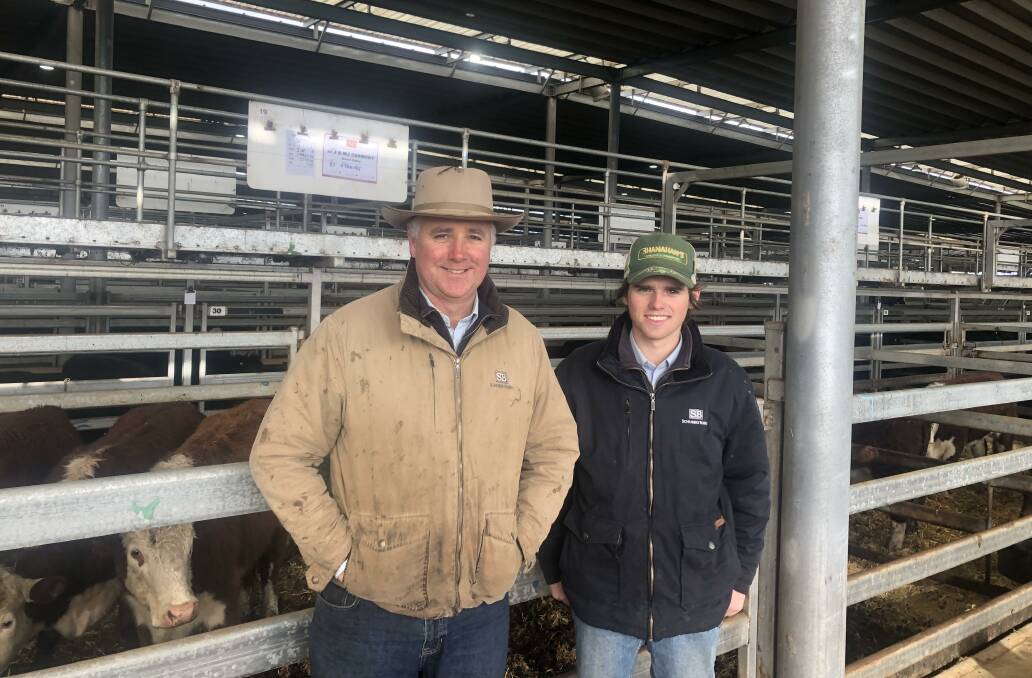 Craig and Harry Schubert, Schubert Boers with a pen of six Hereford steers, 461kg, from J and WJ Carmody, which sold for $2100. Photo: NVLX