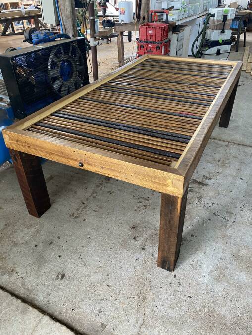 A restored wool table in Jason Porter's Cecil Plains workshop. 