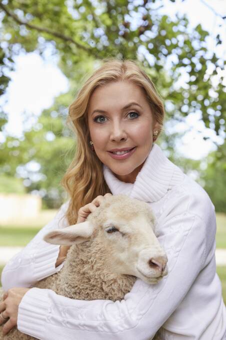 Catriona Rowntree wearing the Quirindi cable knit sweater from the Iris and Wool capsule collection. 