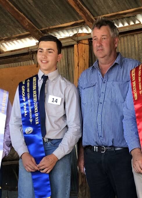 Young Merino judge finalist Campbell Rubie pictured with Koorawatha Show judge Richard Chalker. 