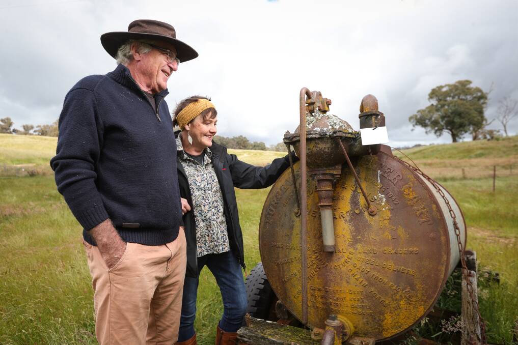 Beechworth's Chris and Karen Bartsh with the 1942 Furphy water tank. Pictures by James Wiltshire