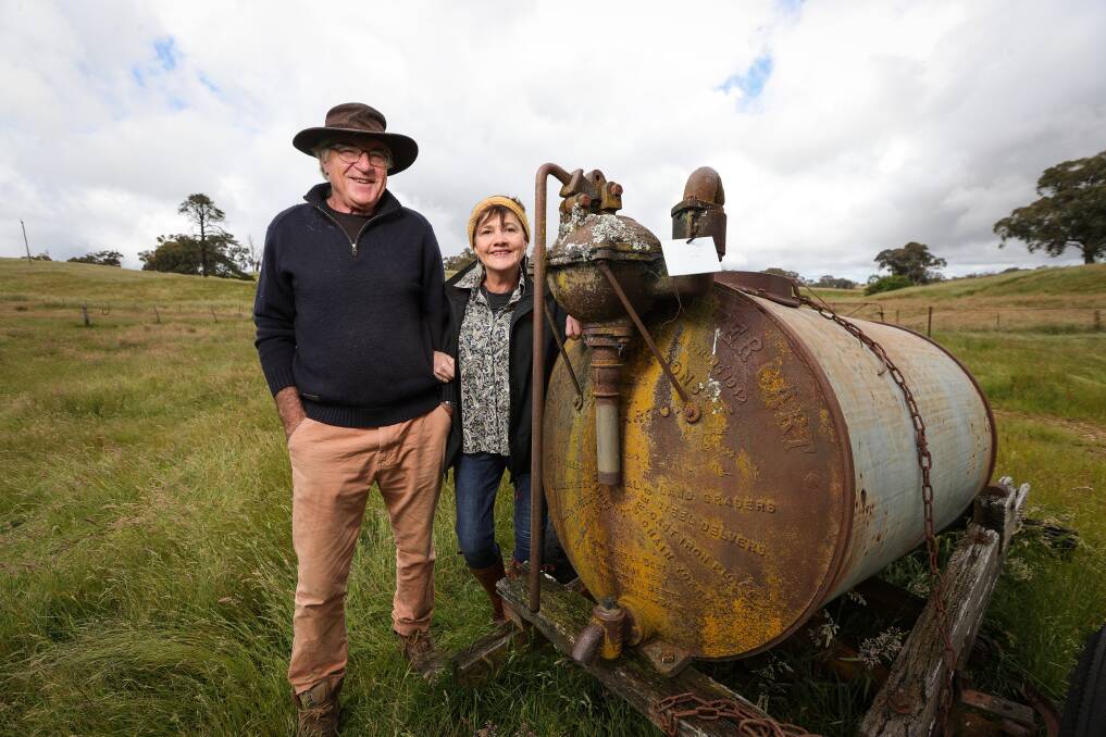Chris and Karen Bartsh with the 1942 Furphy water tank on their Beechworth property which fetched huge interest in an online auction and sold for more than $60,000 to a collector. Picture by James Wiltshire