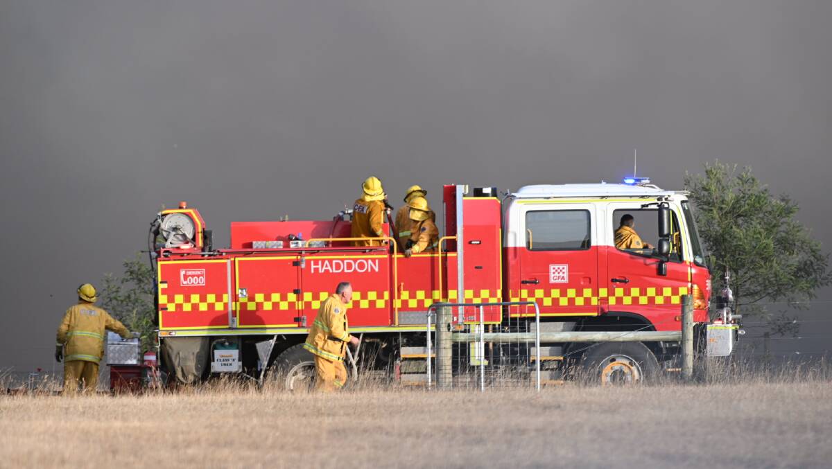 Firefighters working on a blaze in central Victoria in February 2024. Picture by Kate Healy.