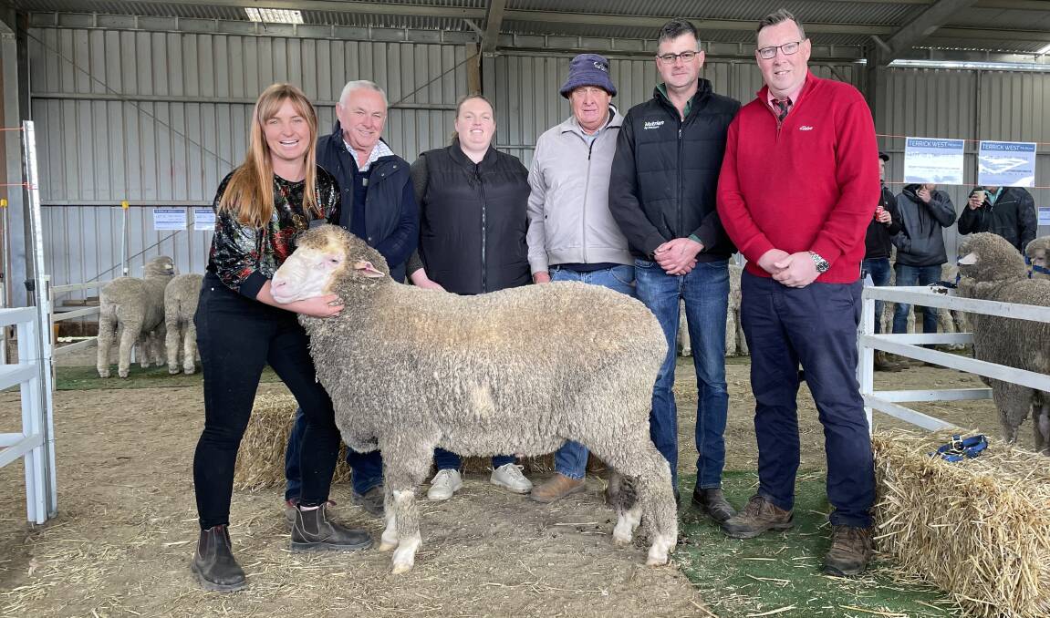 Terrick West Poll co-stud principals Claire and Ross McGauchie, Prairie, buyers Ellie Perryman and Ian Klowss, Oaklands Vectis, Vectis with their top-priced Terrwick West $6500 ram, and Nutrien Horsham agent Roly Coutts and Elders Victoria and Riverina stud stock manager Ross Milne.