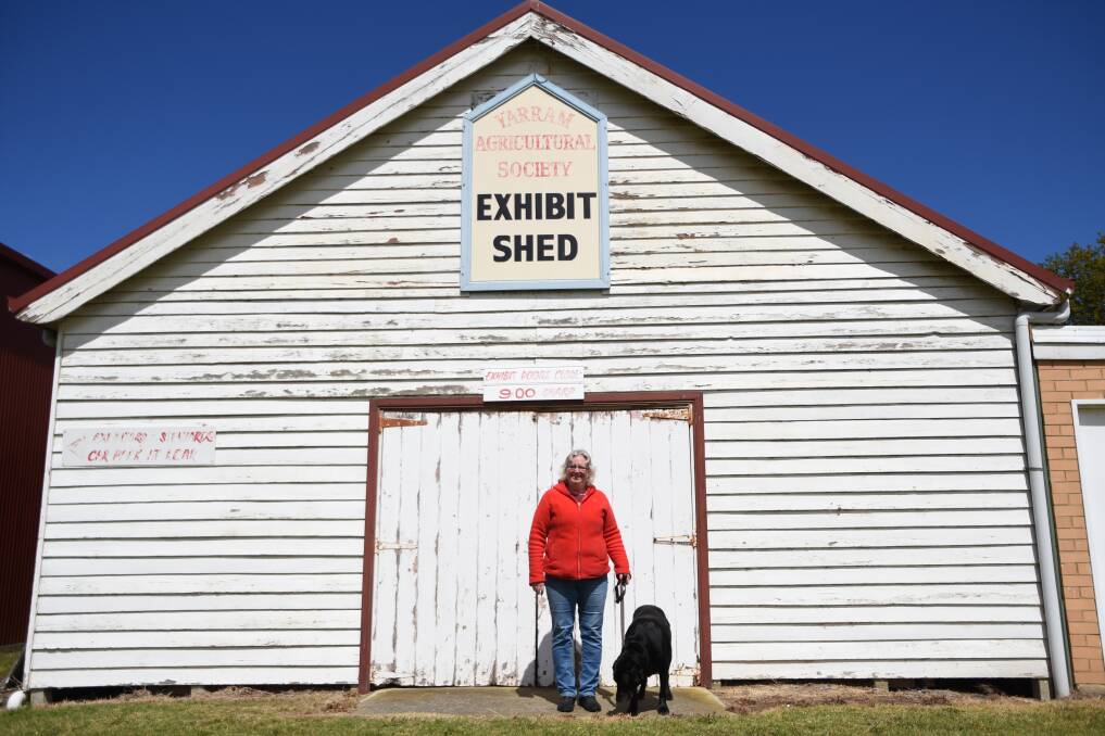 TIME FOR AN OVERHAUL: Yarram Agricultural Show Society president Jenny Le Brocq stands near the old exhibit shed which is set to be replaced after the federal government announced a $20 million fund to update show facilities. Photo by Marian Macdonald.