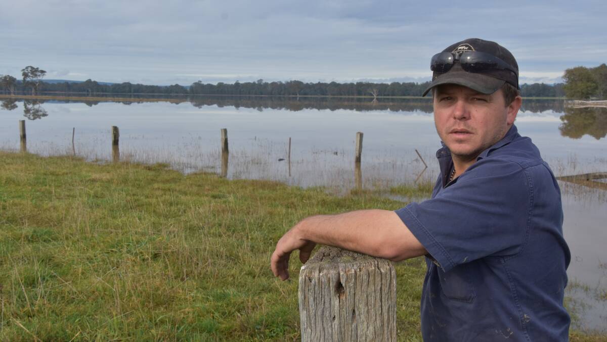 SOAKED: Glengarry graizer Scott Langley, Langley Farms, pictured on his property where low-lying sections were flooded by the Latrobe River, near Traralgon.