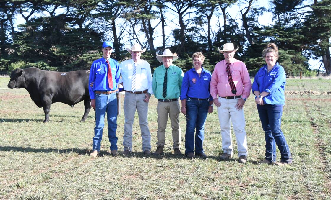 Lot 46 with Hamish Branson, Banquet Angus, Paul Dooley, Paul Dooley Pty Ltd, Garry Whitehead, Nutrien, Noeleen Branson, Banquet Angus, Elders Victoria and Riverina stud stock manager Ross Milne, and Dianna Meulendyks, Banquet Angus.