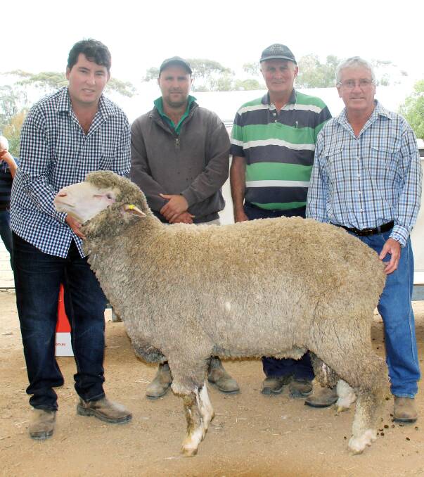 Jack McRae, Oakbank, Gre Gre North, Brayden and Roger Clark, Telopea Downs, Murrawong, SA, and Warren McRae, Oakbank Gre Gre North, with the $10,000 Oakbank Merinos and Poll Merinos ram. Picture supplied by North Central News.