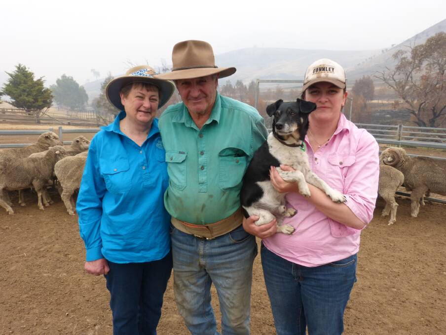 STANDING STRONG: Noleen and Alan Smith with daughter Belinda Smith, Innisfail, Cobungra, have lost 300 sheep due to the fires in East Gippsland.