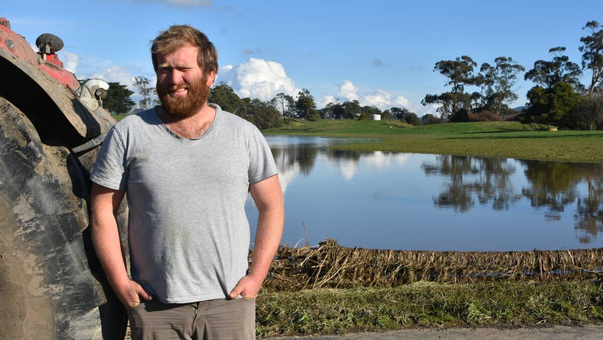 RECOVERY: Yinnar dairy farmer Jason Lee stands in front of what would normally be one of his grazing paddocks.