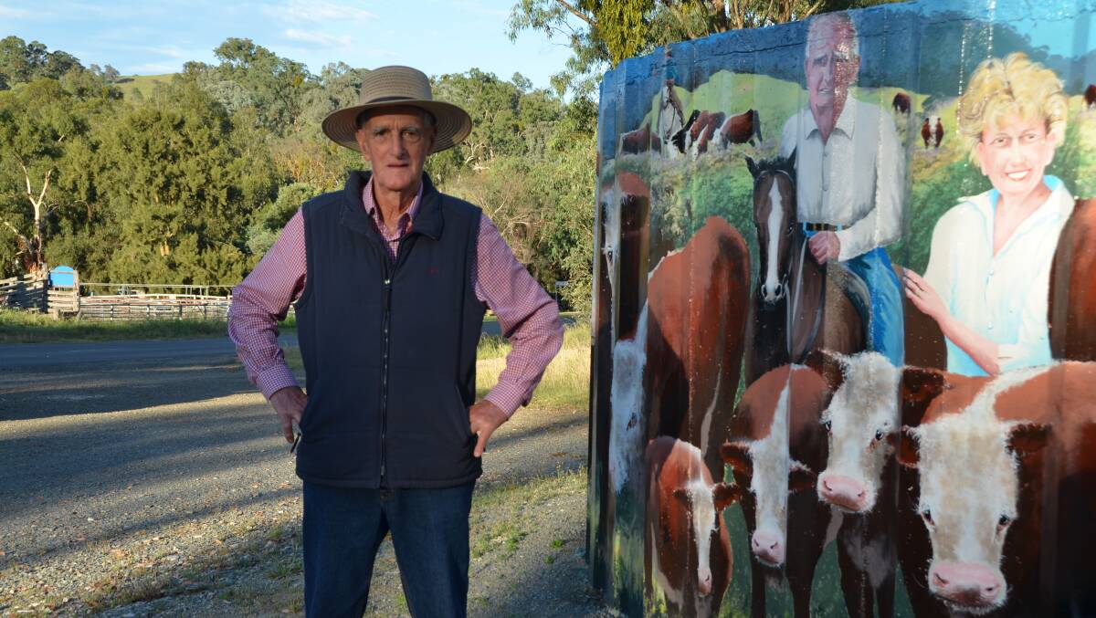 Barry Newcomen, Newcomen Herefords, Ensay, stands beside the water tank which is across the road from the Ensay saleyards.