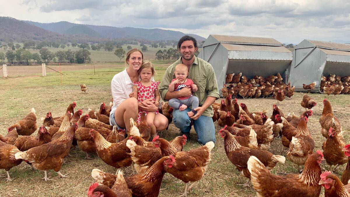 REBUILD: Joscelin and Tom McMillan, Bega Valley Eggs, Bemboka, NSW, with Amahli, 3, and Koa, 10 months, lost two thirds of their flock days after bushfires tore through the region.