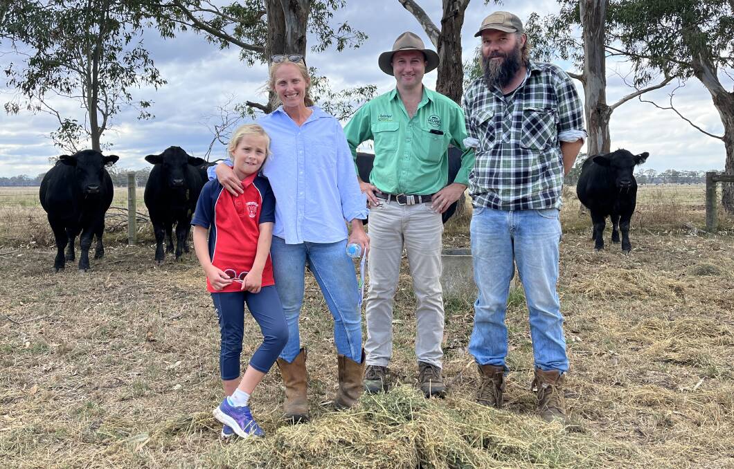 Audrey Mraz, 7, Courtney Ferguson and Dan Mraz, CT Ferguson, Seaspray, bought 11 bulls at auction from Pinora and a further two after the sale. Pictured with Pakenham-based Nutrien Delaney Livestock & Property director Anthony Delaney (second from right).