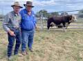 Karoonda Hereford stud principal Paul Sykes, Gelantipy, with long-term buyer and Phelan & Henderson & Co director David Phelan, Staceys Bridge, and one of the top-priced 2024 sale bulls.