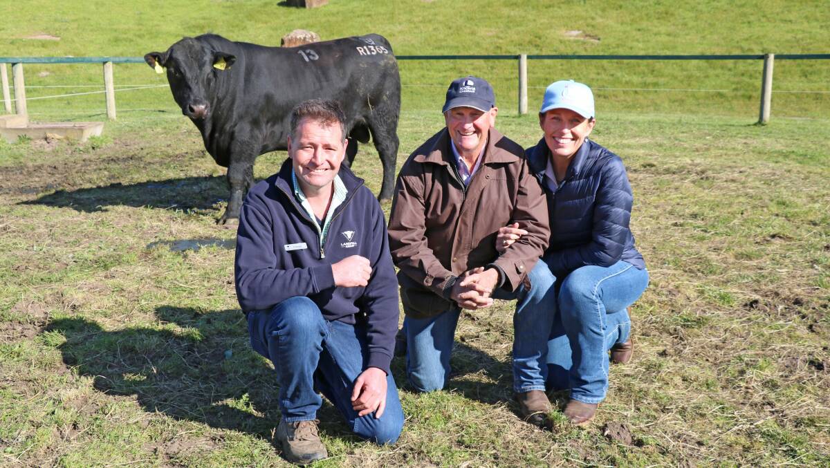 Landfall Angus stud principal Frank Archer with top-priced bull buyers Ted and Alison Laurie, Knowla Livestock, Moppy, NSW, with the top-priced Angus bull.