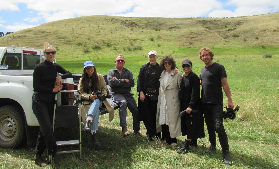 FILM SET: South-west Victorian woolgrower Brendan Finnigan, Kia Ora, Warrnambool, (third from left) with the film crew and members of premium knitwear label Wolfgang Scout.