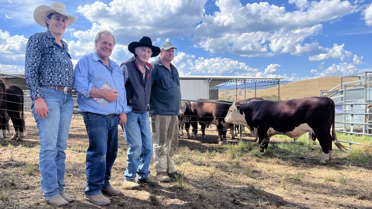 Erica Coulthard, Omeo, Nunniong Hereford stud principal Phillip 'Bluey' Commins, and Ron and Charles Connley, Omeo. The Coulthard/Connley families bought two bulls at the sale, including Lot 1, Nunniong Photograph S020, for $11,000.