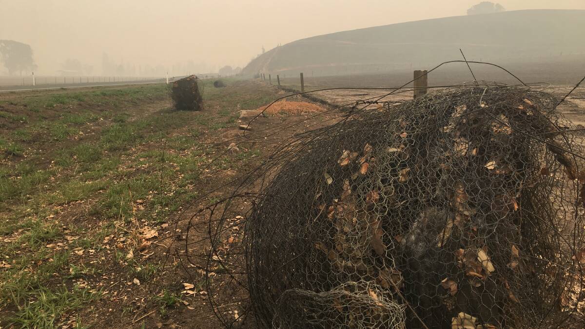 HELP: Burnt fence wire rolled up near Corryong earlier this year.