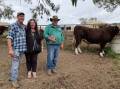 Ensay Hereford graziers Phil and Kerry Geehman and Nunniong Herefords stud principal Phillip 'Bluey' Commins, Ensay, with one of the Geeham's bulls purchased during the on-property sale. Picture by Bryce Eishold