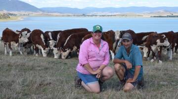 Amanda and John Pendergast, Benambra, with Lake Omeo in the background. Picture by Bryce Eishold