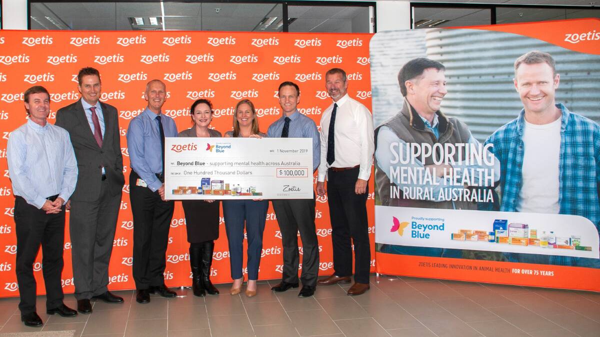 GOOD CAUSE: Zoetis' Mark Willis, Lance Williams, John Reeves, Beyond Blue's Marcia Harkins, Patrice O'Brien and Zoetis' Lincoln Mortlock and Fred Schwenke with a $100,000 cheque for Beyond Blue.