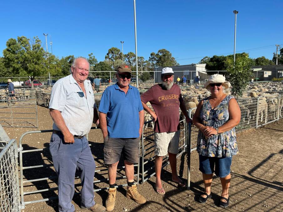 SALE: Chris Brown, Underbool, Peter Walch, Patchewollock and Duke and Marg Nicholl, Boinka, visited the Ouyen sheep sale last week where 7000 lambs were yarded.