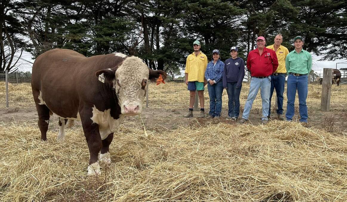 William, Angela and Kaylah Lyons, Wilkah Herefords, Vasey, buyer Anthony Lees, Miga Lake, Andrew Lyons, Wilkah Herefords, Vasey, and Christian Howlett, Nutrien Casterton, with the top-priced bull, Wilkah Paisley. Picture supplied
