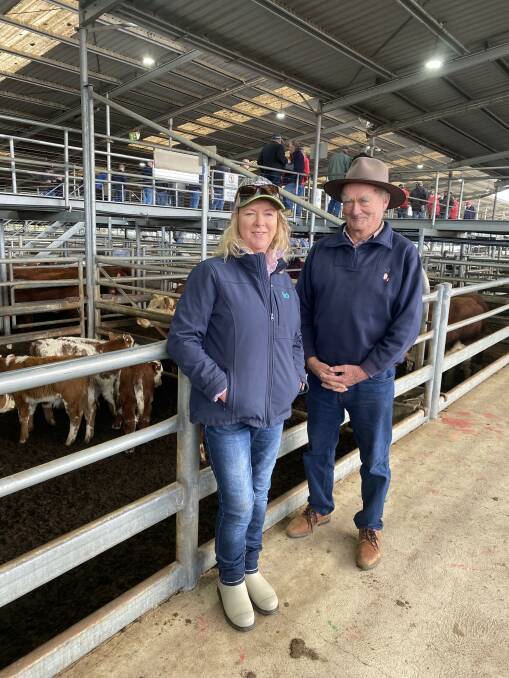 TOP SALE: Vendor Jim Pendergast, Benambra, sold a pen of cows with calves at footy to Annemarie Henderson, Gelantipy, for $3950.